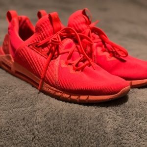 Under Armor neon orange shoes